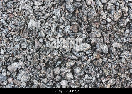 Macerie sfondo. Sfondo di pietra. Materiale di costruzione. Grigio pietra macinata macerie sfondo Foto Stock