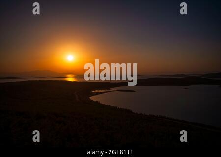 Tramonto sulla collina di Seytan Sofrasi nell'isola di Cunda, Ayvalik, Turchia Foto Stock