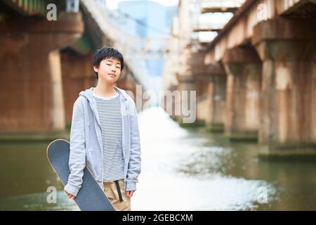 Ragazzo giapponese in centro Foto Stock