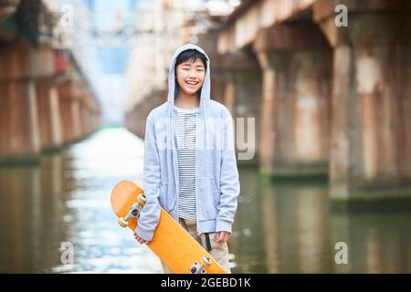 Ragazzo giapponese in centro Foto Stock