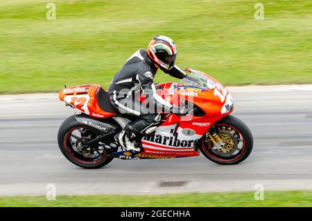 Ducati Desmosedici GP3 moto di Troy Bayliss su pista di salita al Goodwood Festival of Speed Motor Racing evento 2014. Foto Stock