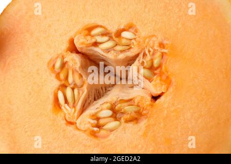 Melone succoso maturo con semi, primo piano Foto Stock