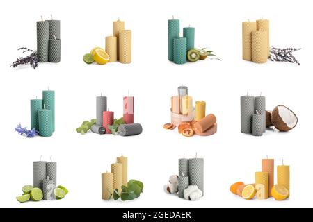 Set di diverse candele aromatiche isolate su bianco Foto Stock