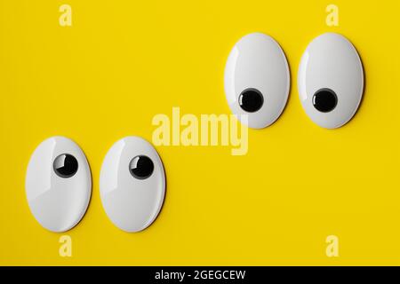 Due paia di occhi divertenti o ondulanti che si guardano l'uno verso l'altro su sfondo giallo, concetto minimale, illustrazione 3D Foto Stock