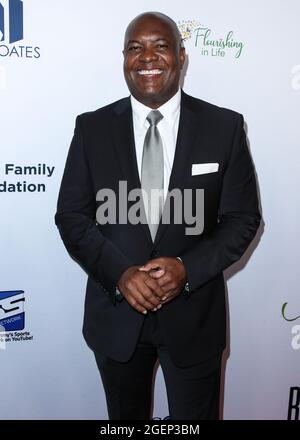 Beverly Hills, Stati Uniti. 20 ago 2021. BEVERLY HILLS, LOS ANGELES, CALIFORNIA, Stati Uniti d'America - 20 AGOSTO: Ex quarterback americano Rodney Peete arriva al 21° annuale Harold and Carole Pump Foundation Gala tenuto presso il Beverly Hilton Hotel il 20 agosto 2021 a Beverly Hills, Los Angeles, California, Stati Uniti. (Foto di Xavier Collin/Image Press Agency/Sipa USA) Credit: Sipa USA/Alamy Live News Foto Stock