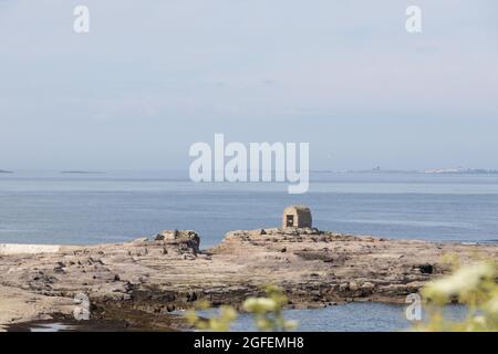 Il vecchio negozio di dinamo a Seahouses Harbour; North Sunderland; Northumberland; Inghilterra. Foto Stock