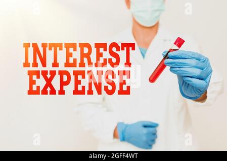 Testo che mostra la spesa di interesse inspiratorio. Business approccio costo del debito che si è verificato durante un periodo di tempo studiando tossico Virus analisi Foto Stock