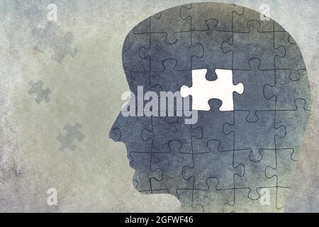 Silhouette di una testa su sfondo testurizzato, puzzle con parte mancante Foto Stock