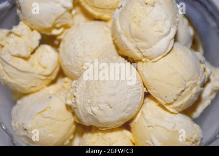 Cucchiai di gelato, gelato alla vaniglia Foto Stock