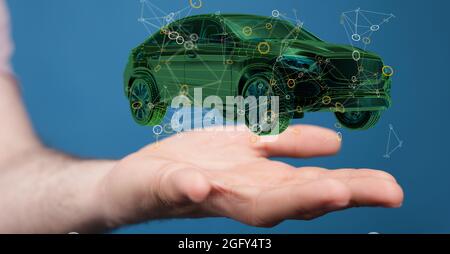 Primo piano di un'auto rappresentata in 3d nel palmo di un uomo Foto Stock
