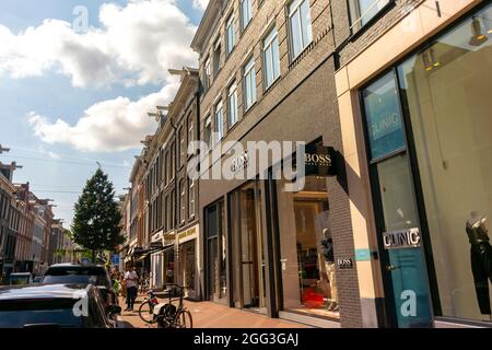 Amsterdam, Olanda, Street Scenes, Row Luxury Shops, Fronts Townhouse nel quartiere storico della città vecchia, centro città Foto Stock