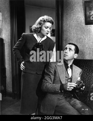 CLAIRE TREVOR E HUMPHREY BOGART NEL FANTASTICO DR. CLITTERHOUSE 1938 regista ANATOLE LITVAK suona la sceneggiatura di barre Lyndon John Wexley e John Huston music Max Steiner Warner Bros. Foto Stock