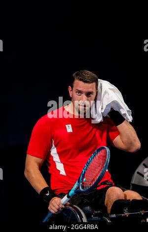 Joachim Gerard, tennista belga in sedia a rotelle, ha ritratto in azione durante la partita tra l'americano Ratzlaff e il belga Gerard, al secondo turno Foto Stock