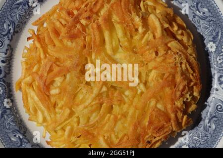 Un delizioso Appenzeller rösti ripieno di formaggio Foto Stock