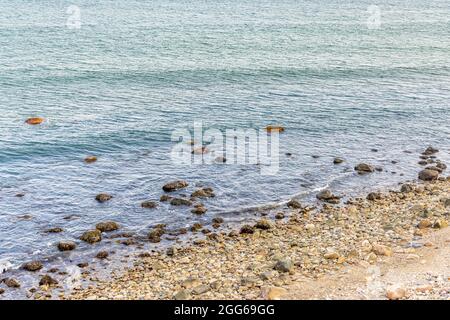 Spiaggia rocciosa a Camp Hero Park, Montauk, NY Foto Stock