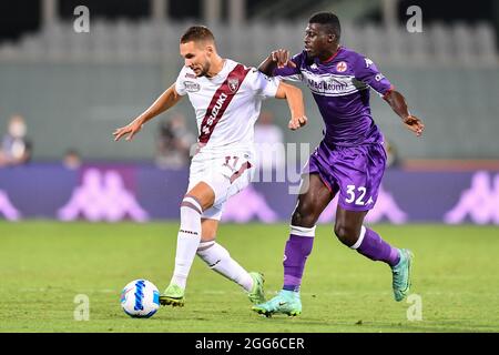 Stadio Artemio Frachi, Firenze, 28 agosto 2021, Marko Pjaca (Torino) e Alfred Duncan (Fiorentina) durante ACF Fiorentina vs Torino FC - i Foto Stock