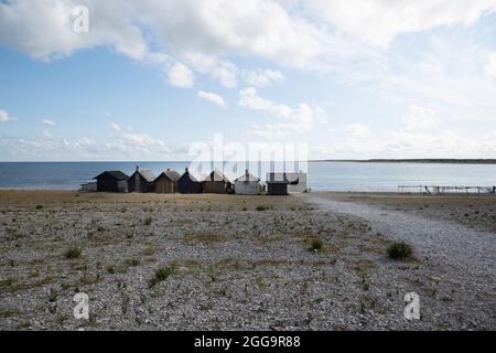 Vecchie capanne di pesca a Helgumannen, un antico villaggio di pescatori a Fårö, Svezia Foto Stock