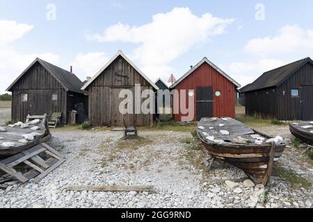 Vecchie capanne di pesca a Helgumannen, un antico villaggio di pescatori a Fårö, Svezia Foto Stock