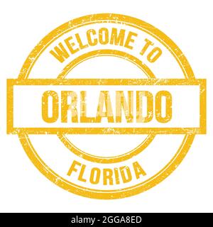 BENVENUTI A ORLANDO - FLORIDA, parole scritte su un semplice francobollo rotondo giallo Foto Stock