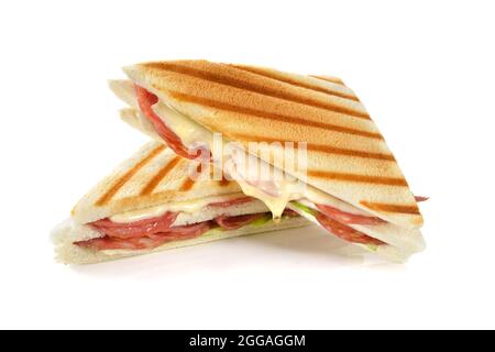 Doppio sandwich grigliato con salame italiano e formaggio fondente su sfondo bianco Foto Stock