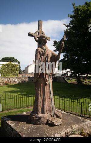 Statua di St Aiden Lindisfarne, Holy Island, Northumberland, Inghilterra. Foto Stock