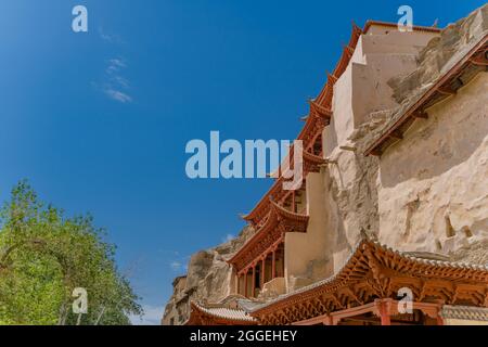 L'esterno delle grotte di Mogao a Dunhuang, Cina. Foto Stock