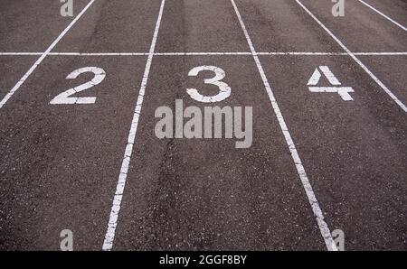Dettaglio del numero da correre su un atletica, sport e assistenza sanitaria pista Foto Stock