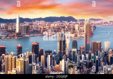 Hong Kong - Tramonto sul porto di Victoria, Cina Foto Stock