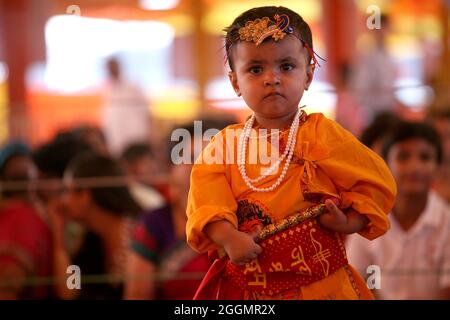 L'indiano celebra il festival Janmastami in occasione del giorno di nascita di Lord Krishna a Nuova Delhi. Foto Stock