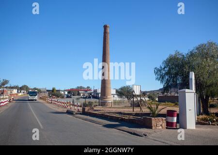 Storica miniera di rame Smokestack costruito nel 1880, okiep, Namaqualand Sud Africa Foto Stock