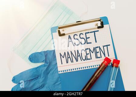 Testo che mostra Inspiration Asset Management. Approccio aziendale gestito investimento di beni di una persona o di un'azienda che prepara e scrive la prescrizione Foto Stock