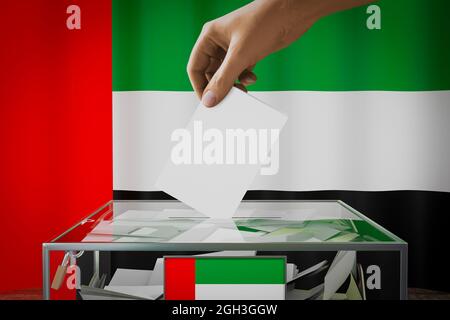 Bandiera degli Emirati Arabi Uniti, mano che cade la scheda di voto in una scatola - voto, concetto elettorale - illustrazione 3D Foto Stock