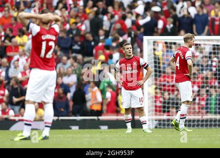 Il Jack Wilshere di Arsenal è sconsolato durante la partita della Barclays Premier League tra l'Arsenal e l'Aston Villa all'Emirates Stadium di Londra il 17 agosto 2013. David KleinLandov Foto Stock