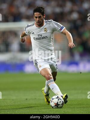 Real Madrid's Isco in azione durante la semifinale della squadra di calcio della prima gamba della UEFA Champion League tra il Real Madrid e il Bayern Monaco a Santiago Bernabeu a Madrid, in Spagna, il 23 aprile 2014. PIC David Klein Foto Stock