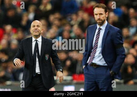 Il direttore italiano Luigi di Biagio e il direttore inglese Gareth Southgate durante la partita internazionale amichevole al Wembley Stadium di Londra. Data foto 27 marzo 2018. Il credito d'immagine dovrebbe leggere: Charlie Forgham-Bailey/Sportimage via PA Images Foto Stock