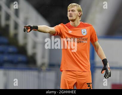 Ryan Schofeld di Huddersfield Town durante la partita del campionato Sky Bet al John Smith's Stadium di Huddersfield. Data foto: 20 febbraio 2021. Il credito dovrebbe essere: Andrew Yates/Sportimage via PA Images Foto Stock