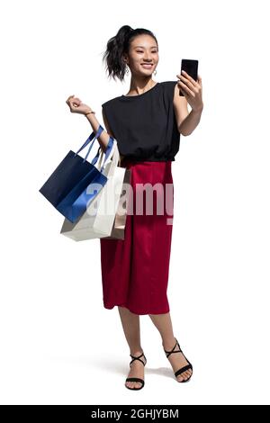 Moda giovane donna shopping Foto Stock