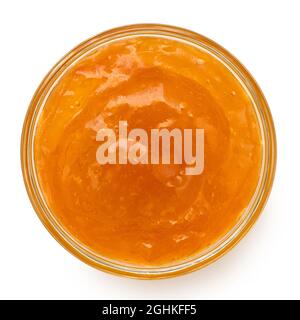 Marmellata di albicocche in un recipiente di vetro isolato su bianco. Vista dall'alto. Foto Stock