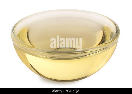 Ciotola di vetro di olio di girasole isolato su bianco. Foto Stock
