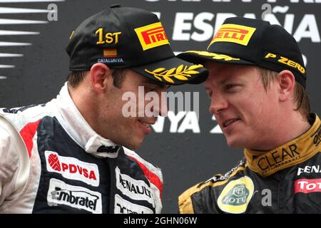 Pastor Maldonado (VEN), Williams F1 Team e Kimi Raikkonen (fin), Lotus F1 Team 13.05.2012. Campionato del mondo di Formula 1, Rd 5, Gran Premio di Spagna, Barcellona, Spagna, Giorno di gara Foto Stock