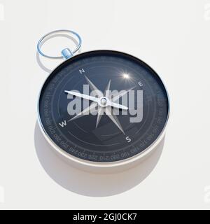 Bussola magnetica su superficie piana. L'ago è rivolto verso nord-ovest. Illustrazione del rendering 3D. Foto Stock