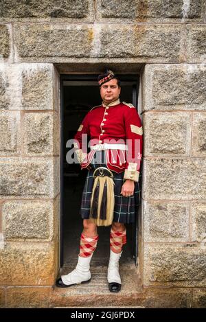 Canada, Nuova Scozia, Halifax, Citadel Hill National Historic Site, re-enattore soldato in uniforme scozzese. (SIG.) Foto Stock