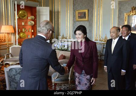 STOCCOLMA 2013-03-04 il re Carl Gustaf e la regina Silvia di Svezia hanno incontrato il primo ministro della Thailandia, la sig.ra YingLuck Shinawatra, durante una cerimonia al Palazzo reale di Stoccolma, Svezia, 4 marzo 2013. Il primo Ministro è in visita ufficiale in Svezia. Anders Wiklund / SCANPIX / kod 10040 Foto Stock