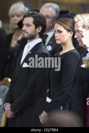 STOCCOLMA 2013-03-16 il principe Carl Philip, la principessa Madeleine e Chris OÂ´Neill al funerale della principessa Lilian nella Cappella reale del Palazzo reale di Stoccolma sabato 16 marzo 2013.. Foto: Maja Suslin / SCANPIX / kod 10300 Foto Stock