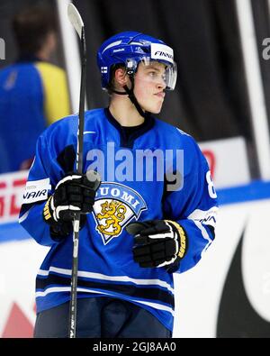 MALMO 2013-12-27 in Finlandia Saku Maenalanen durante la partita preliminare di hockey su ghiaccio del World Junior Championship tra Finlandia e Norvegia alla Malmo Arena di Malmo, Svezia, il 27 dicembre 2013. Foto: Andreas Hillergren / TT / code10600 Foto Stock