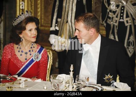 STOCCOLMA 20180117 la regina svedese Silvia e il presidente islandese GuÃ°ni JÃ³hannesson durante un banchetto al palazzo reale di Stoccolma. La coppia presidenziale si trova in Svezia per una visita statale di tre giorni. Foto: Christine Olsson / TT / code 10430 Foto Stock