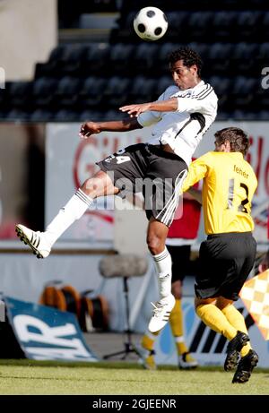 Rosenborg's Roy Miller og NAC Breda's Csaba Feher durante la Coppa Intertoto round 3 partita Rosenborg (Norvegia) - NAC Breda (Olanda). Rosenborg sconfisse NAC Breda con 2-0. Foto Stock