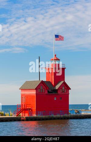 Holland Lighthouse (Big Red) sul lago Michigan, Olanda, Michigan. Foto Stock