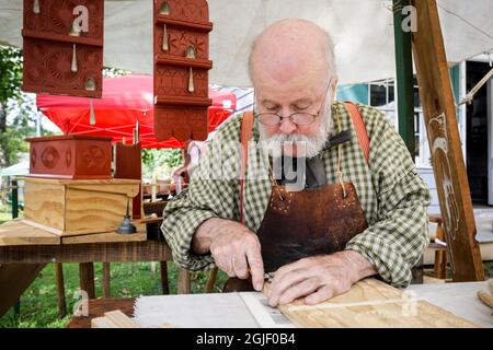 County Fair a Old Richmond Town su Staten Island, New York. Storico re enactors dimostrazione artigianato. (Solo per uso editoriale) Foto Stock