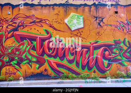 Grfitti Alley si trova all'interno del quartiere della moda nel centro di Toronto, Ontario. A tre isolati dalla Spadina Avenue a sud della Queen Stree Foto Stock